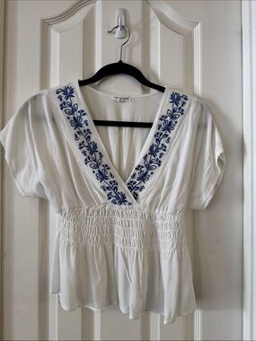 love on a hanger White V-Neck Peplum Top with Blue Embroidery